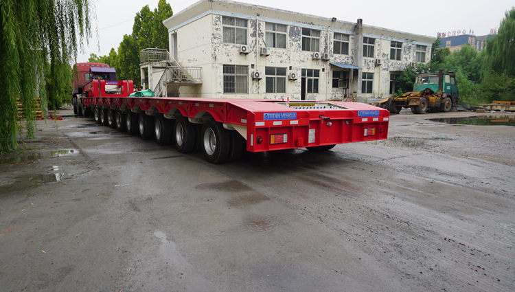 9 axles extendable trailer for wind tower section.jpg